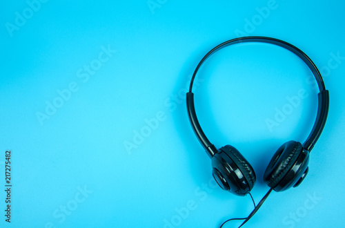 Headphone isolated on blue pastel background