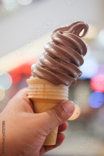 Chocolate soft serve ice cream cone