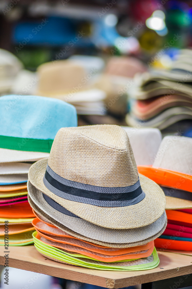 The exhibited colorful hats for the beach 
