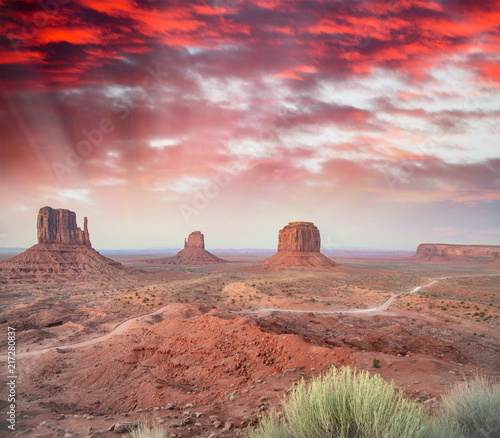 Monument Valley National Park buttes on a beautiful summer sunset