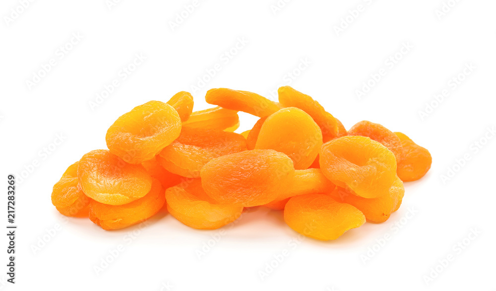 Pile of dried apricots on white background