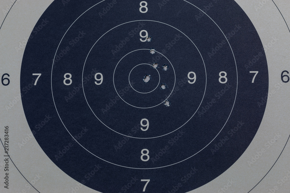 Naklejka premium Bullet holes in the black target
