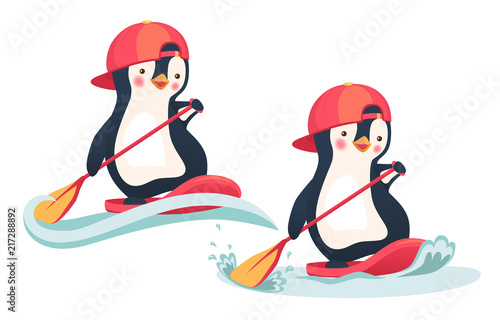 penguin floating on a SUP board