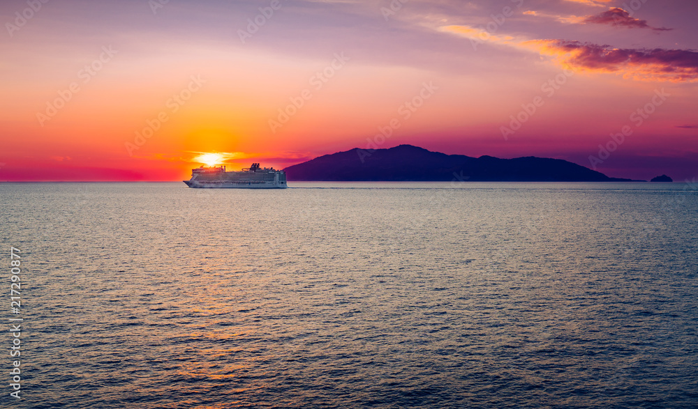 Cruise ship at sunset. Gulf of Naples, Italy