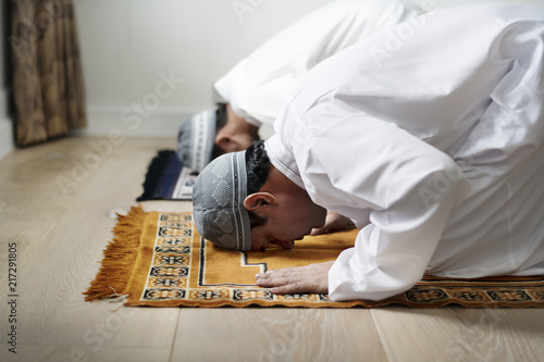 Muslim prayers in Sujud posture photo