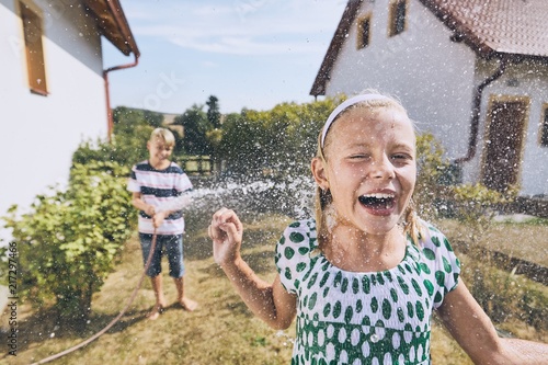 Photography Children having fun with splashing water