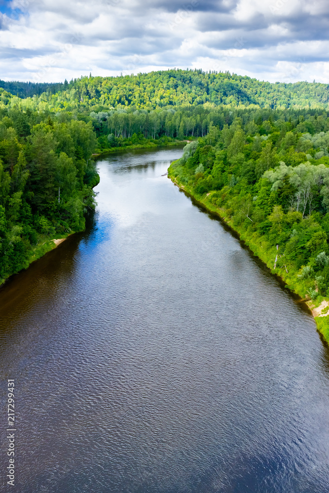 aerial view of calm river and green trees around, Riga, Latvia aerial view of calm river and green trees around, Riga, Latvia