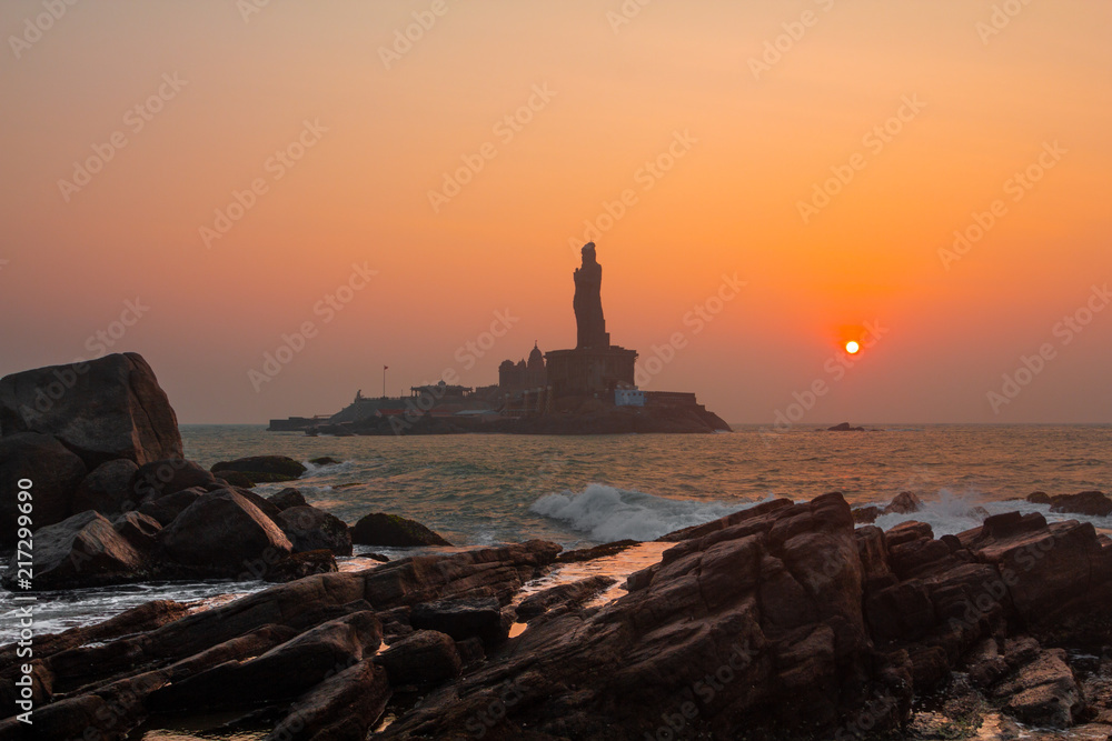 Sunrise over statue of Thiruvalluvar / Tiruvalluvar. Kanyakumari, Tamilnadu.