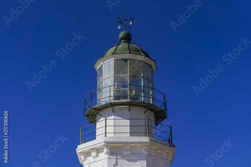 Wallpaper Mural Deserted lighthouse against blue background. Day view of lighthouse Armenistis manufactured in 1891 on the north-western tip of Mykonos, Greece. Torontodigital.ca
