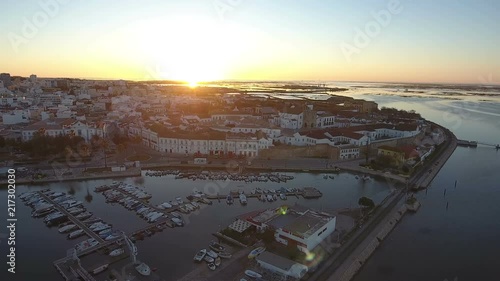Aerial. View from the sky, sunrise, over the tourist city of Faro.