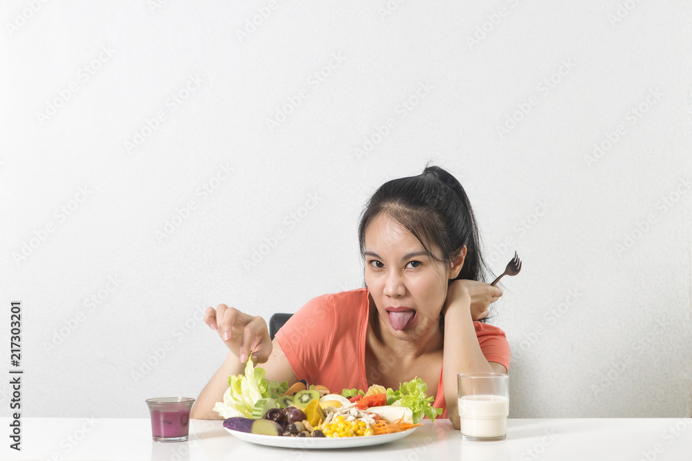 Woman does not like vegetable. Unhappy woman does not like healthy food, Emotional face. Woman does not like vegetable. Unhappy woman does not like healthy food, Emotional face.