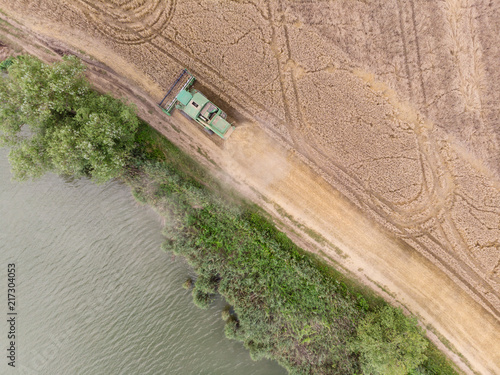 Harvesting cornbine at summer photo