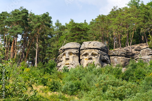 Sandstone rock sculptures Certovy Hlavy - Devils Heads created by Vaclav Levy in 1840s	near Zelizy, Czech Republic photo