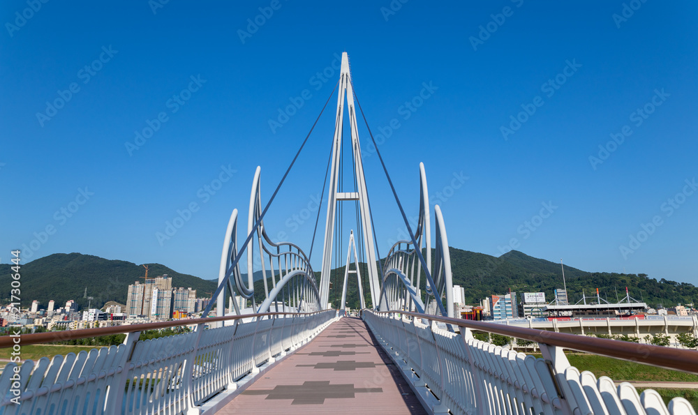 Fototapeta premium Yangsan cloud trails in riverside downtown