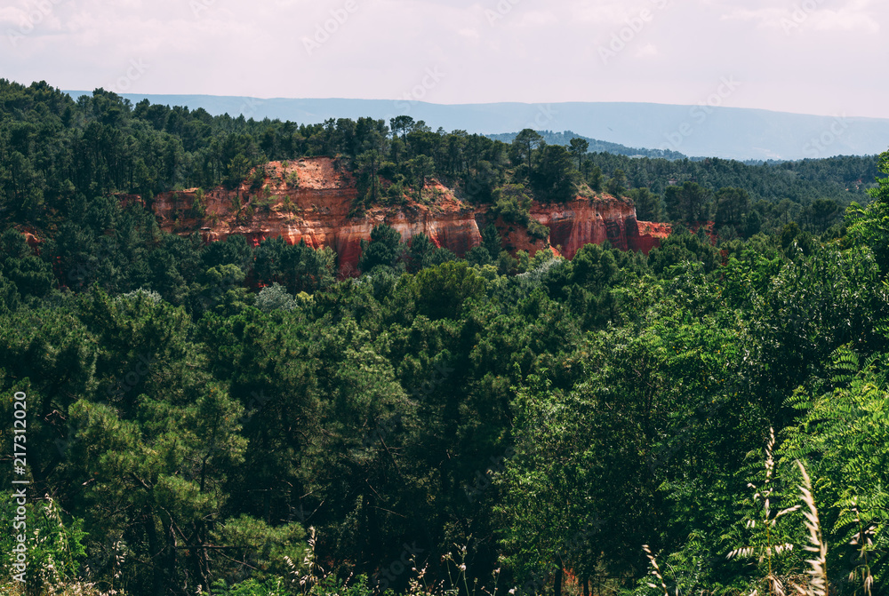 Red ocre rock near french village Roussillon in evening sun