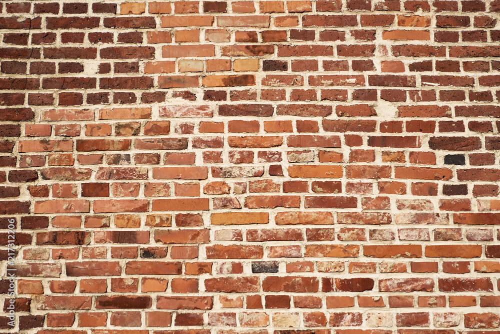 Old red brick wall on a sunny day Old red brick wall on a sunny day