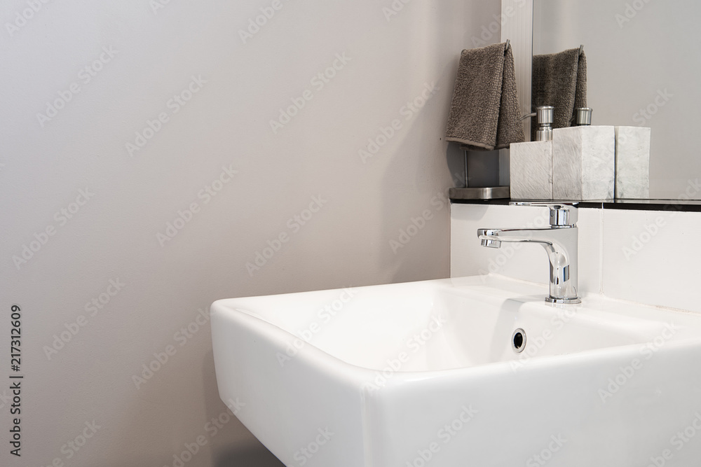 Fototapeta premium Bathroom interior with sink and faucet