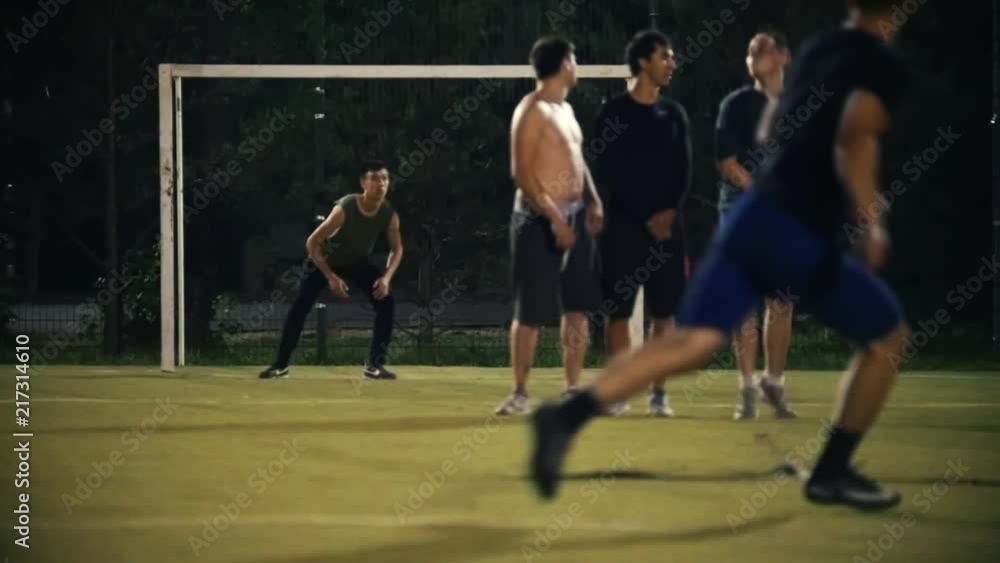 Three men built a wall of penalty, at the gate is the goalkeeper, the ...