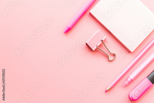 pink stationery on pink background top view flat lay
