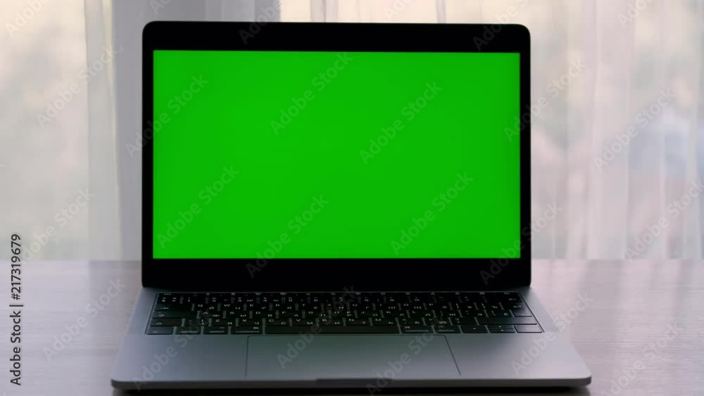 STATIC laptop computer with a key green screen STATIC laptop computer with a key green screen