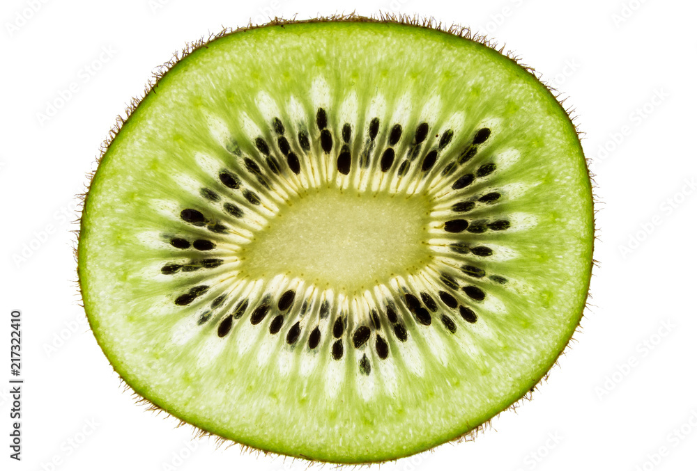 Sliced kiwifruit rings on white background top view macro Sliced kiwifruit rings on white background top view macro
