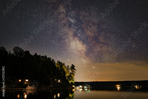 Bilde på lerret The Milky Way at night over Walloon Lake in Northern Michigan, USA