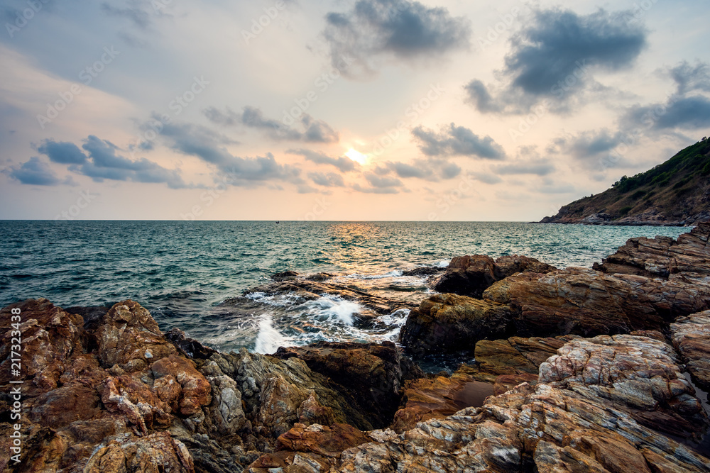 Sea rocks with wave on sunset Sea rocks with wave on sunset