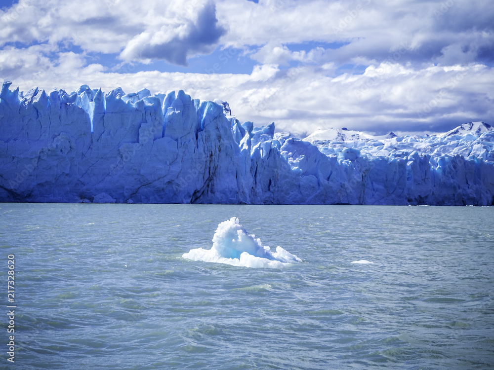 Melted glacier drifting in water