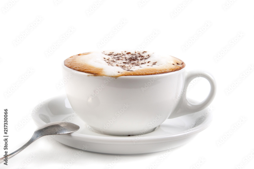 Full cup of hot aromatic coffee on saucer with spoon. Good Morning Coffee Isolated on white background Full cup of hot aromatic coffee on saucer with spoon. Good Morning Coffee Isolated on white background