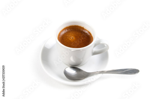 Full cup of hot aromatic coffee on saucer with spoon. Good Morning Coffee Isolated on white background