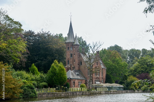 The lake of love "Minnewater" in Bruges at cold, cloudy day