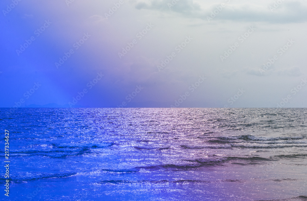 Beautiful and clear sea atmosphere edited in blue, purple and light blue color, colorful nature