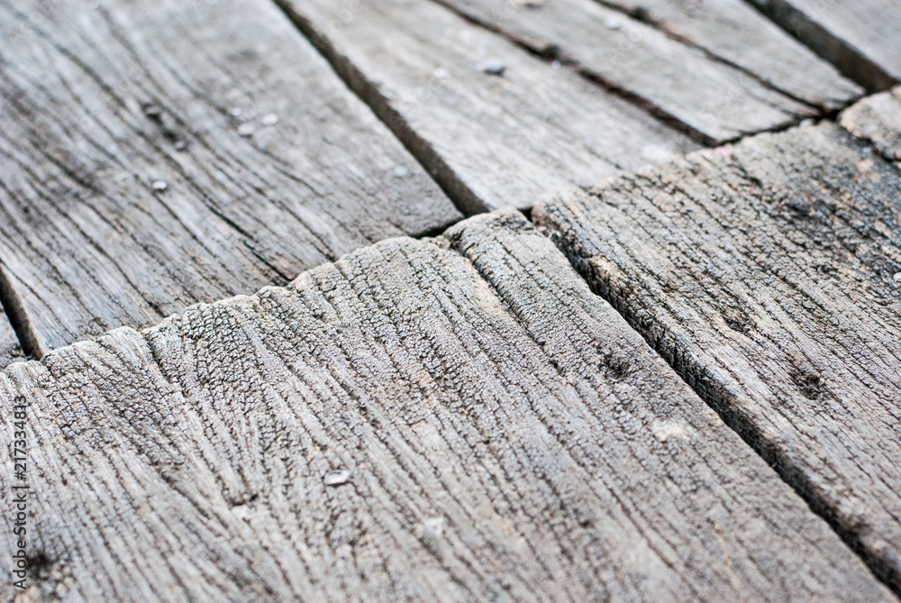 Wooden floor of old style Thai house close up showing its beautiful pattern, abstract photo Wooden floor of old style Thai house close up showing its beautiful pattern, abstract photo