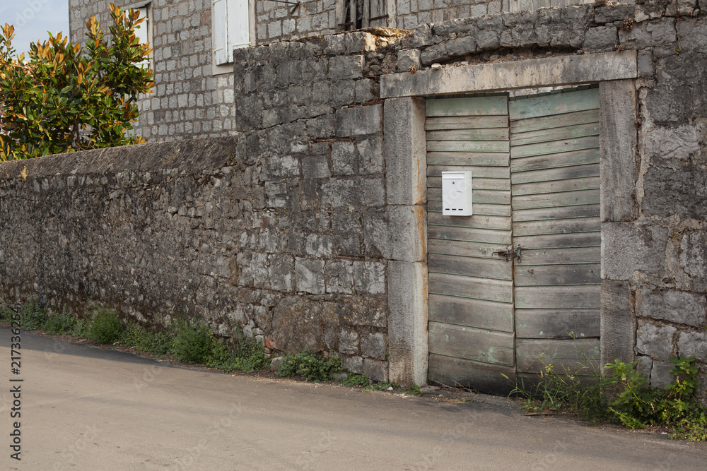 Old stone fences with wooden doors.jpg