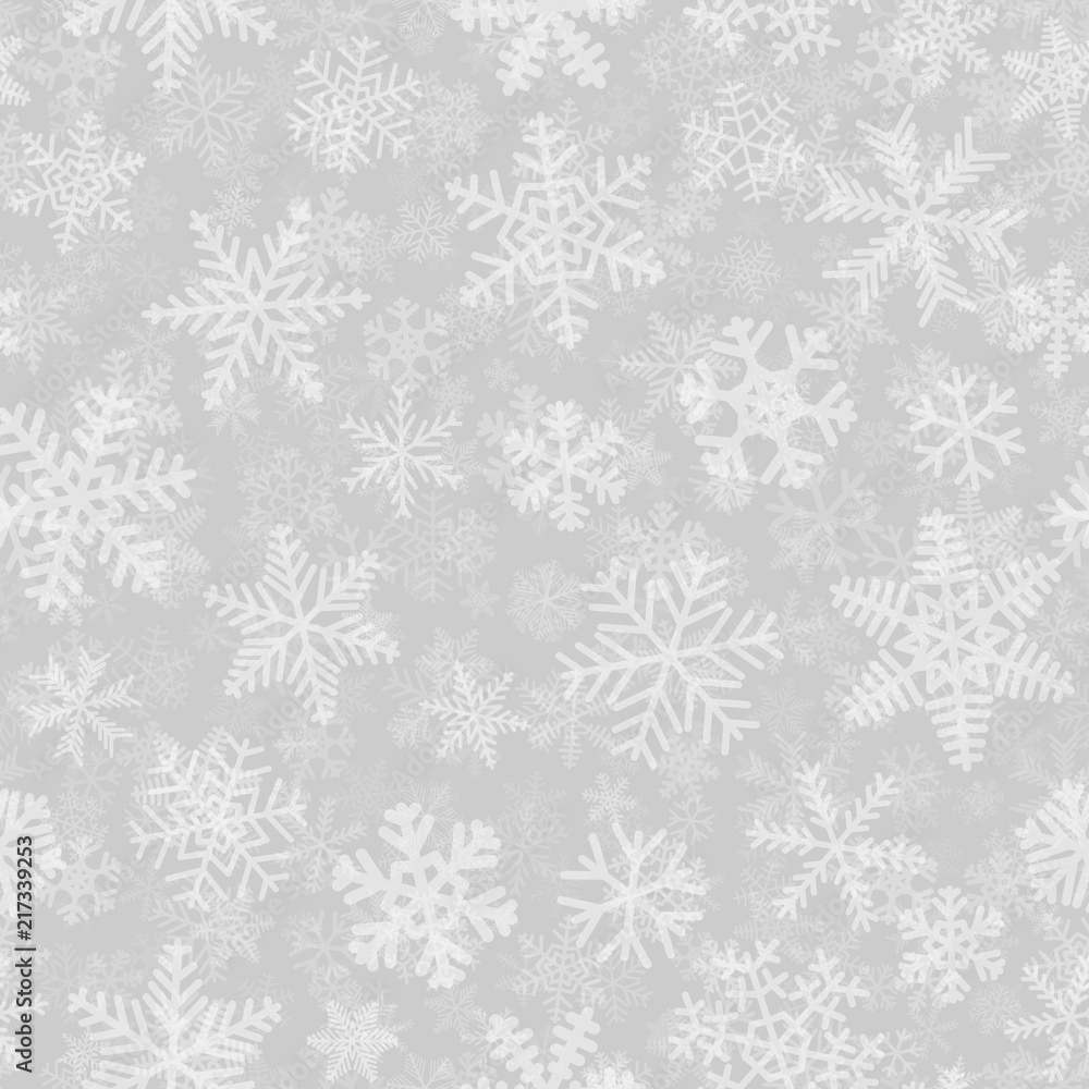Christmas seamless pattern of many layers of snowflakes of different shapes, sizes and transparency. White on gray background Christmas seamless pattern of many layers of snowflakes of different shapes, sizes and transparency. White on gray background