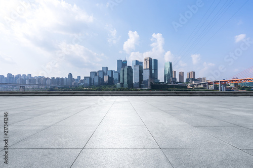 city skyline with empty square © THINK b
