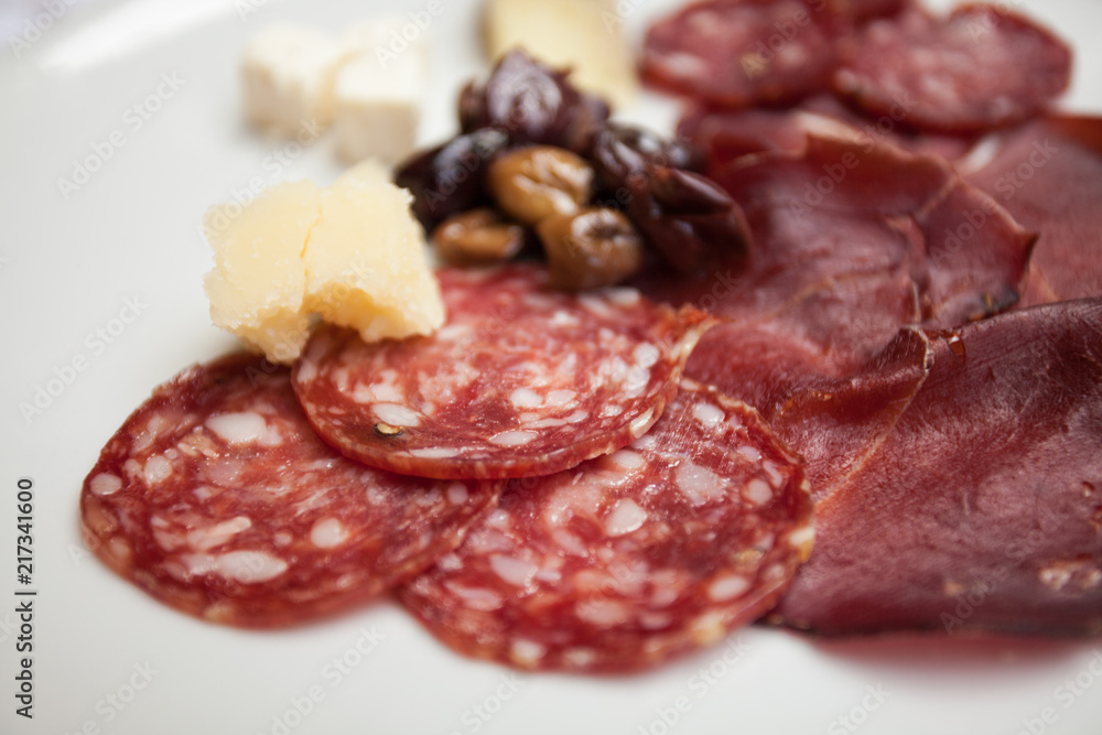 Italian antipasto of game and cheese. Italian antipasto of game and cheese.