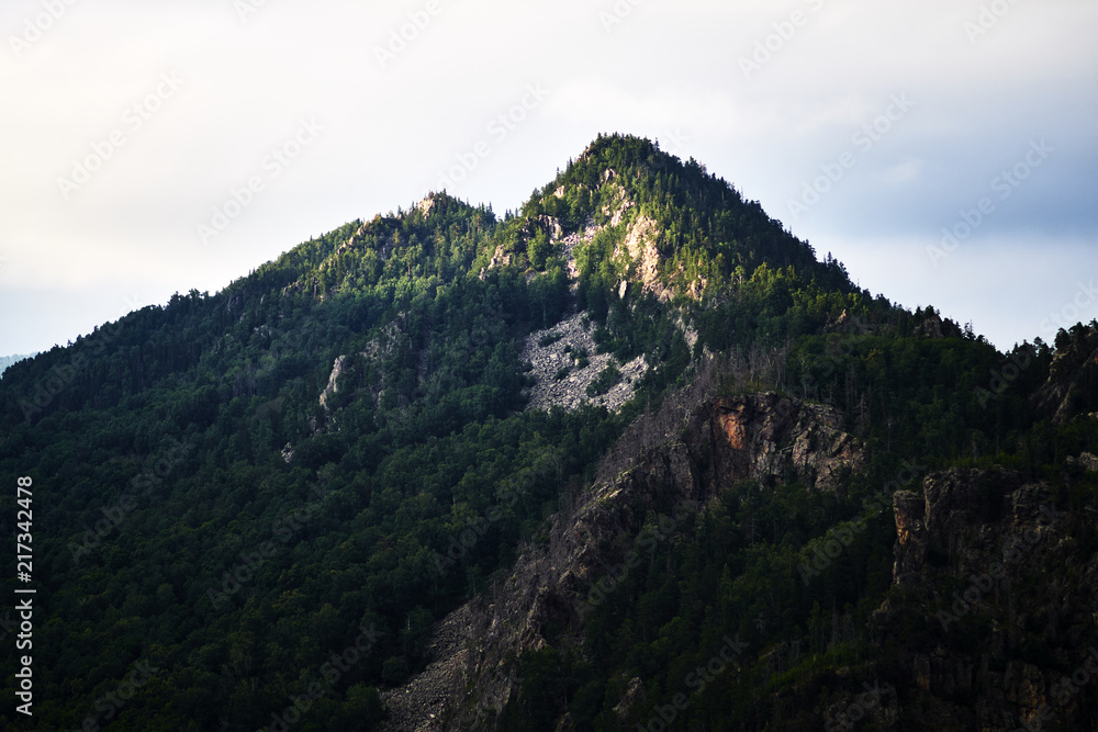 mountain peak illuminated by the sun