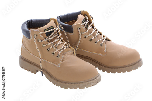 Brown work boots isolated on a white background