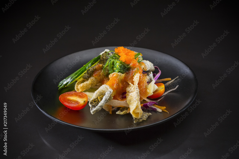 Crispy Salmon Spicy Salad, Japanese food, fuision food, Salmon salad in Thai style, selective focus Crispy Salmon Spicy Salad, Japanese food, fuision food, Salmon salad in Thai style, selective focus