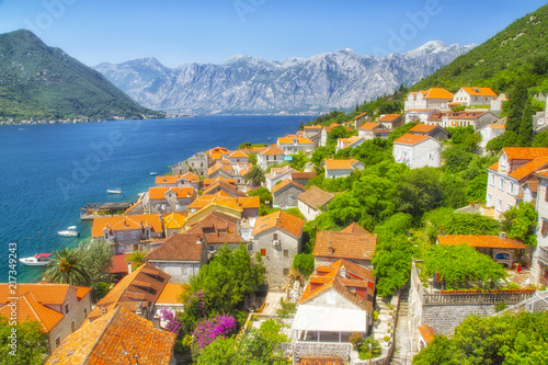 Kotor, Montenegro. Bay of Kotor bay is one of the most beautiful places on Adriatic Sea, it boasts the preserved Venetian fortress, old tiny villages, medieval towns and scenic mountains. © savantermedia