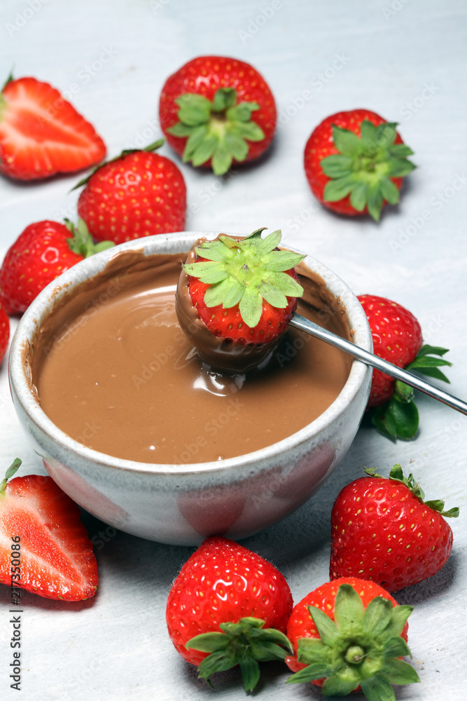 Fondue with Melting chocolate or melted chocolate and strawberry. Fondue with Melting chocolate or melted chocolate and strawberry.