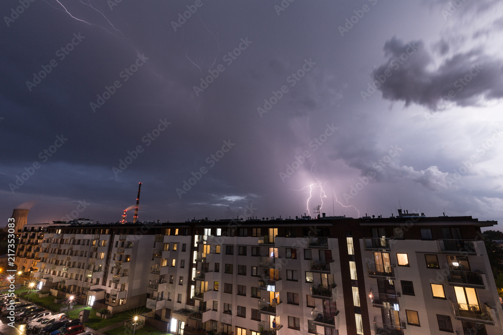 Fototapeta premium Violent weather collapse over the city, storms and heavy rains