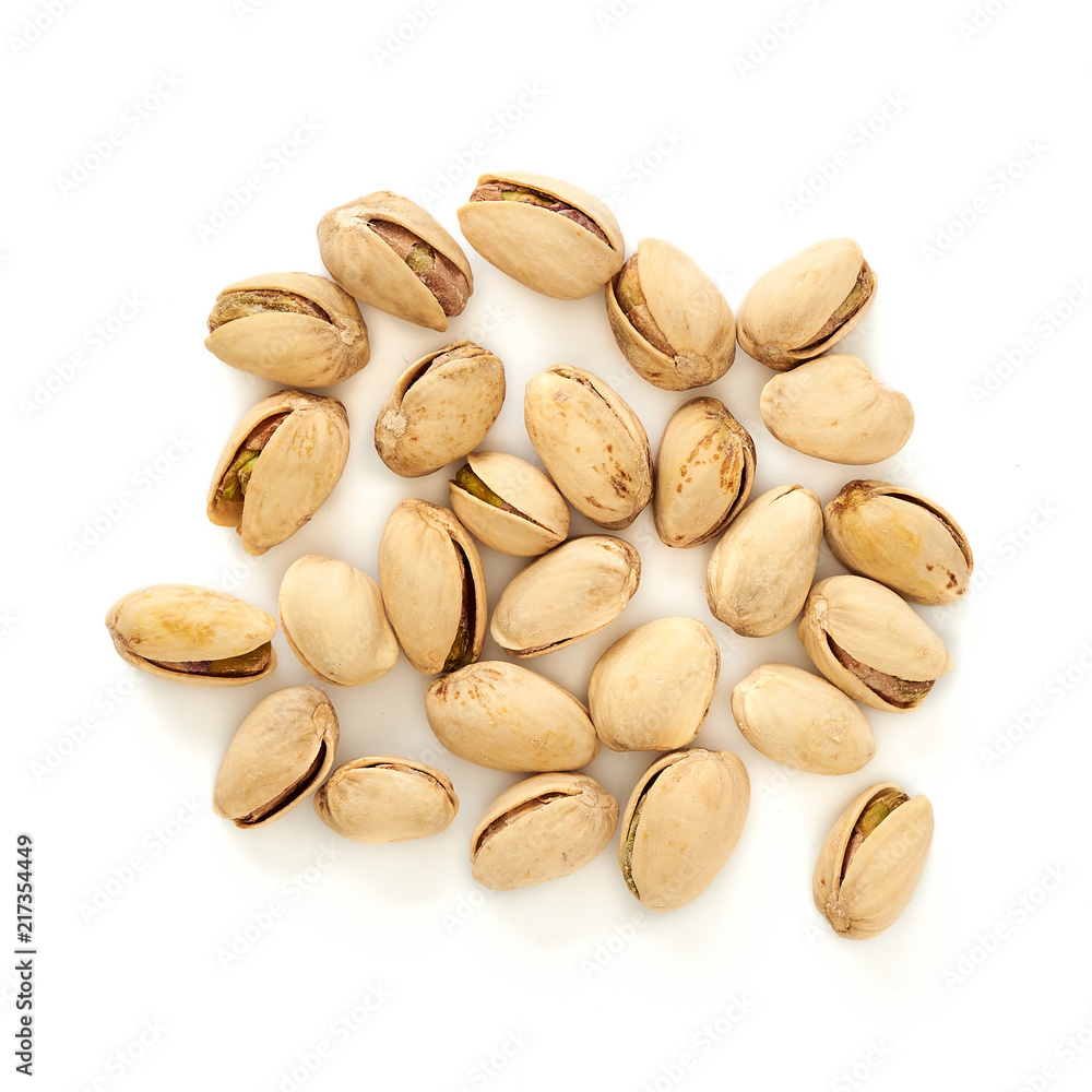 Fototapeta premium Salted pistachios isolated on white background. Top view.