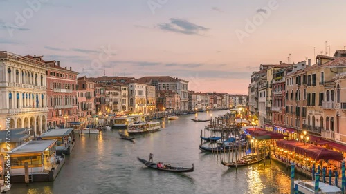 Venice city skyline day to night sunset timelapse from Rialto Bridge and Venice Grand Canal, Venice, Italy 4K Time lapse