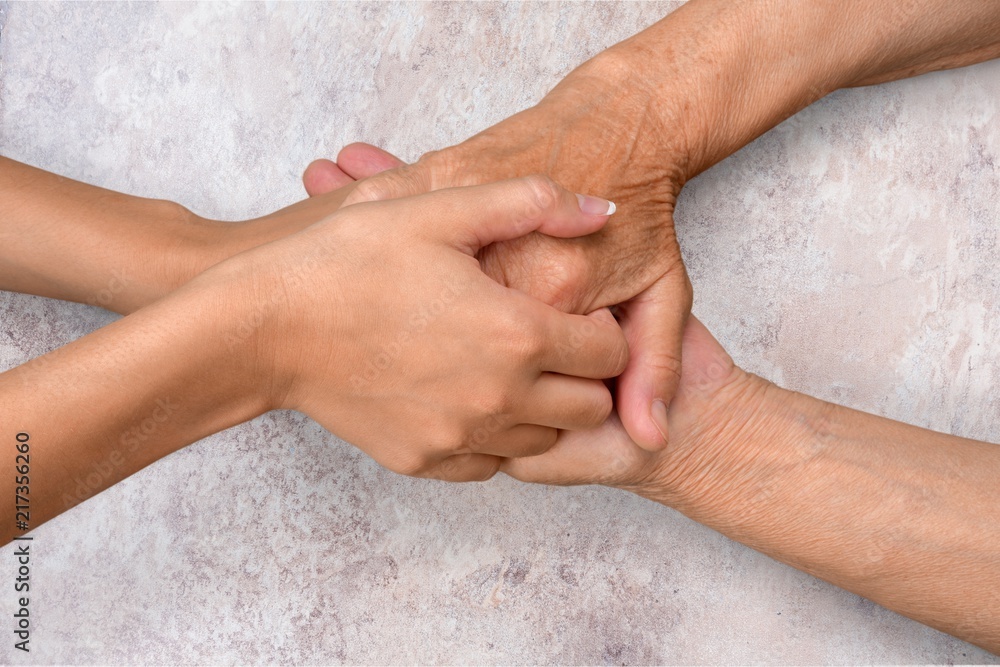 Hands of the old man and a