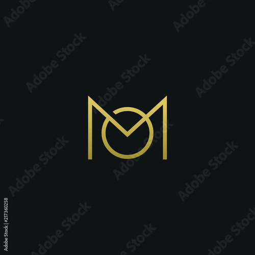 Modern unique elegant MO black and golden color initial based letter icon logo photo