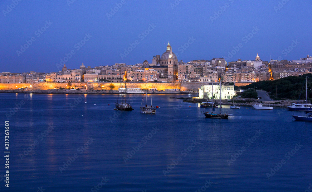 Early morning lights of Valletta Grand Harbour from Sliema, Malta