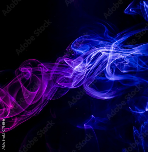 Colored smoke on black background