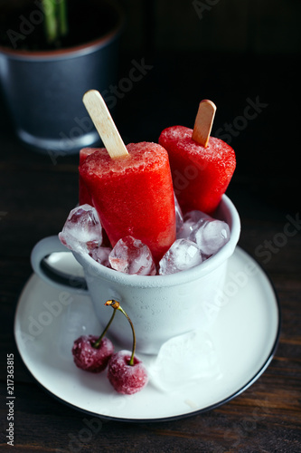 Fruit ice from cherry in a mug, ice cream